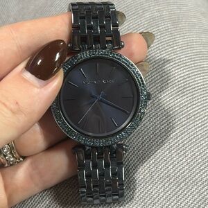 Dark navy Michael kors watch used in box. Great condition